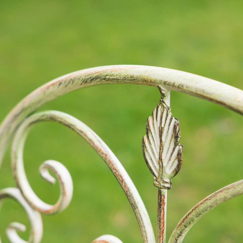 Close-up of Blaisdon chair finsihed in antiqued cream.