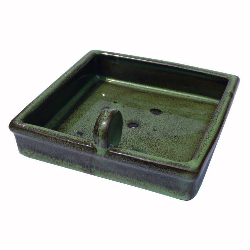 Green ceramic hedgehog food bowl
