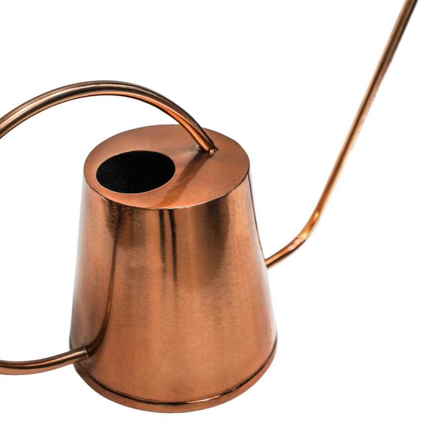 Closeup of indoor Kensington copper watering can