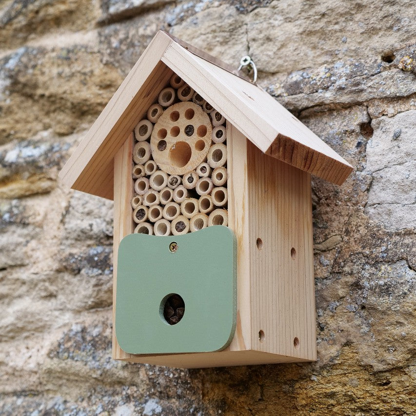 Bee barn attached to stone wall