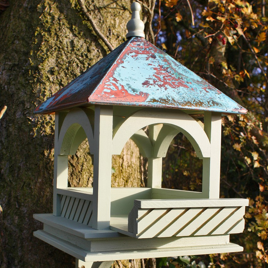 Large Bempton bird table attached to tree with tray pulled out