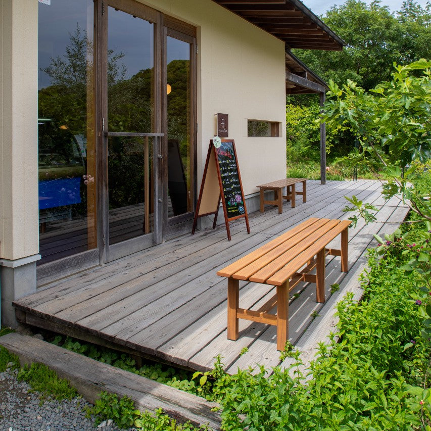 VegTrug aluminium bench natural wood effect on wooden decking